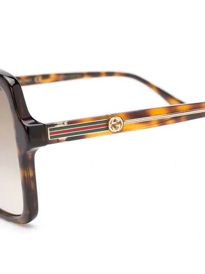 Shop Gucci Oversized Sunglasses In Brown