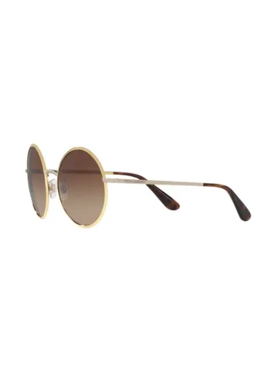 Shop Dolce & Gabbana Round Sunglasses In Gold