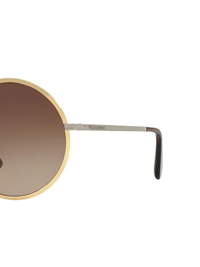 Shop Dolce & Gabbana Round Sunglasses In Gold