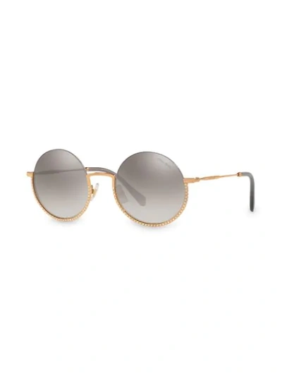 Shop Miu Miu Société Round Frame Sunglasses In Gold