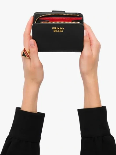 Shop Prada Saffiano Leather Zip Wallet In Black