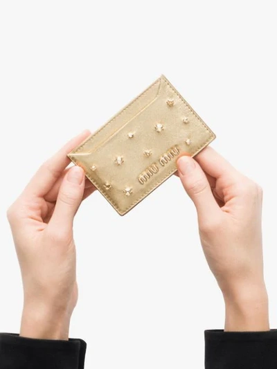 Shop Miu Miu Crystal Embellished Card Holder In Metallic