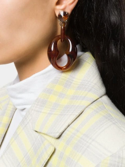 Shop Prada Maxi Drop Earrings In Brown