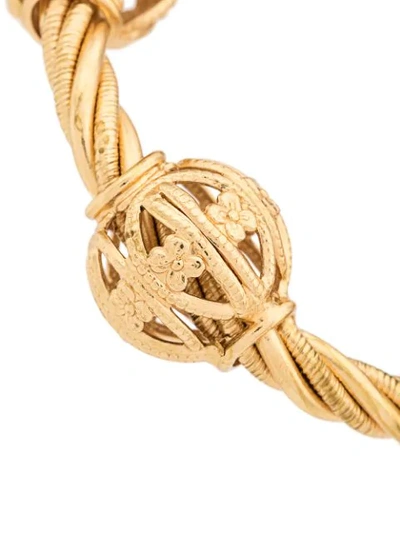 Shop Dolce & Gabbana Twisted Hoop Earrings In Gold