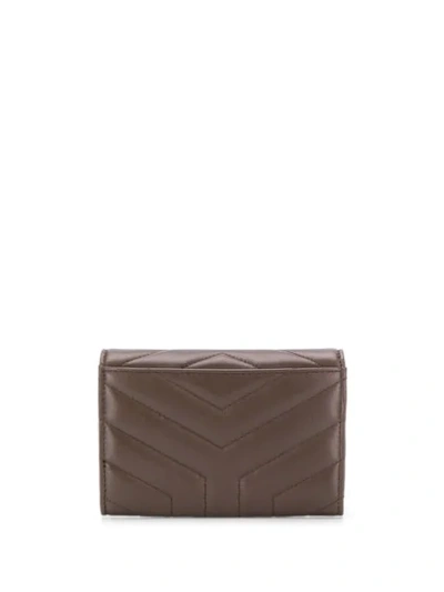 Shop Saint Laurent Quilted Monogram Wallet - Brown