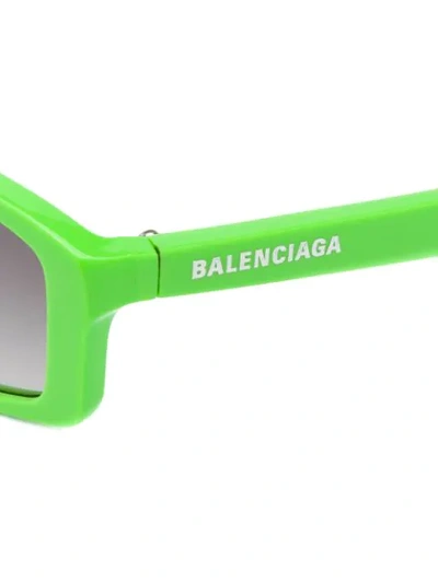 Shop Balenciaga Rectangular Sunglasses In 3512 Green