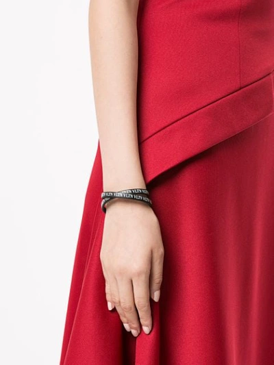 Shop Valentino Garavani Vltn Wrap Bracelet In Black