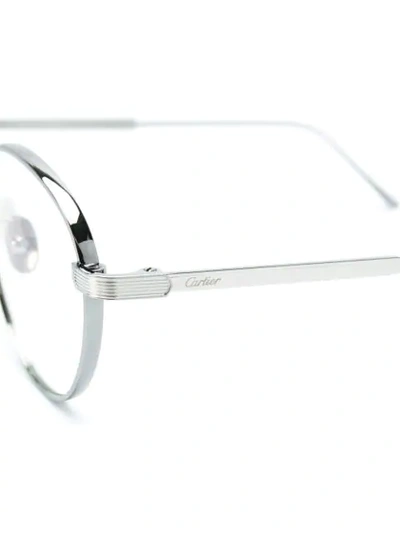 Shop Cartier C De  Glasses - Metallic