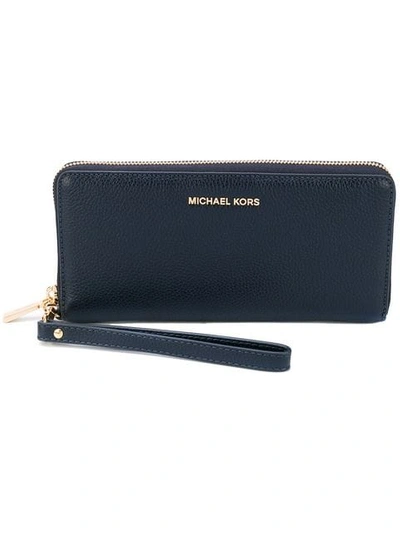Shop Michael Michael Kors Mercer Continental Wristlet Wallet In Blue