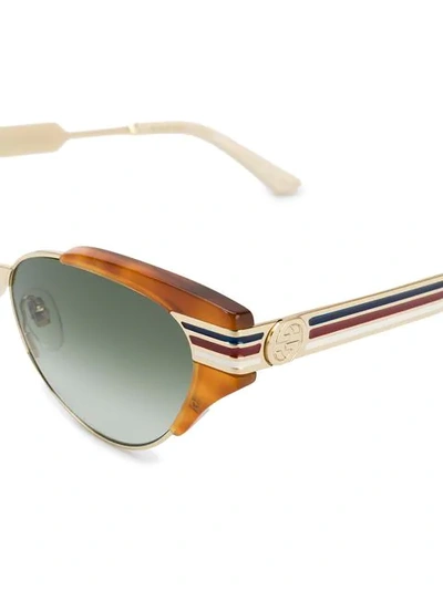 Shop Gucci Striped Detail Sunglasses In 003
