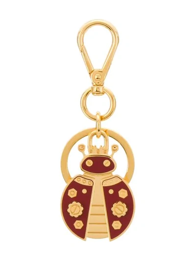 Shop Prada Ladybug Keyring In F068z Gold Red