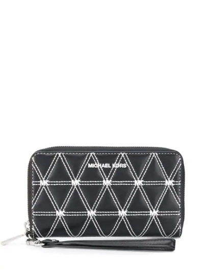 Shop Michael Michael Kors Large Quilted Wallet In Black
