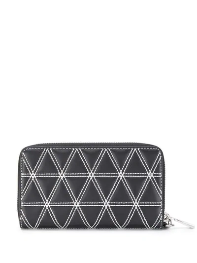 Shop Michael Michael Kors Large Quilted Wallet In Black