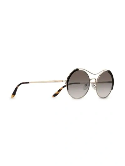 Shop Prada Round Frame Sunglasses In Black