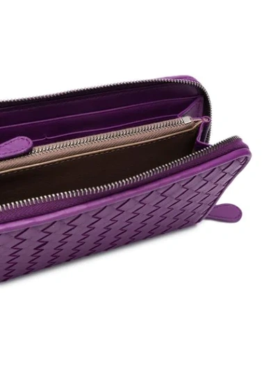 Shop Bottega Veneta Intrecciato Continental Wallet - Purple