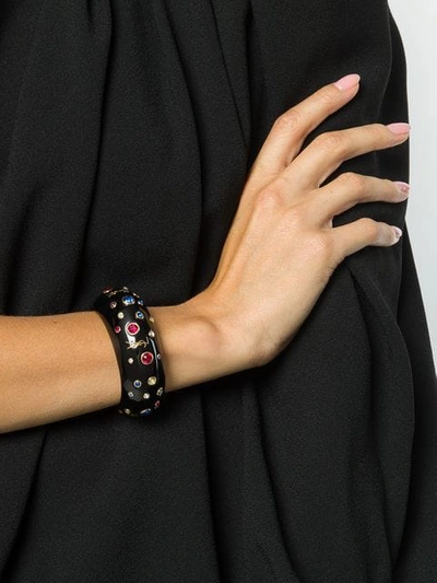 Shop Saint Laurent Stone Embellished Bracelet In Black
