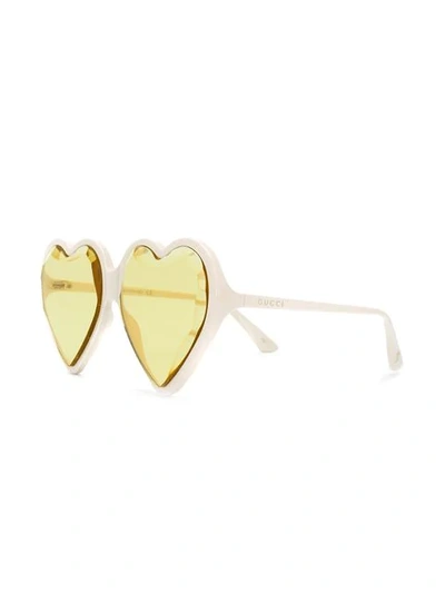 Shop Gucci Heart Sunglasses In 003