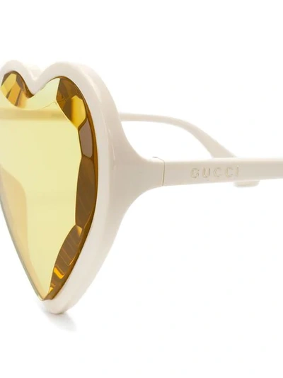 Shop Gucci Heart Sunglasses In 003