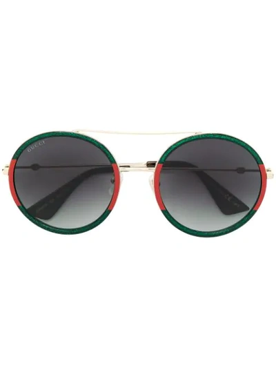 Shop Gucci Round Frame Sunglasses In Metallic