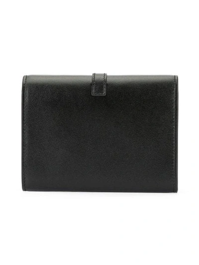 Shop Saint Laurent Large Sulpice Wallet In Black