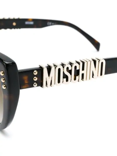 Shop Moschino Eyewear Cat Eye Sunglasses In Brown