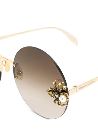 Shop Alexander Mcqueen Eyewear Jeweled Spider Sunglasses - Gold