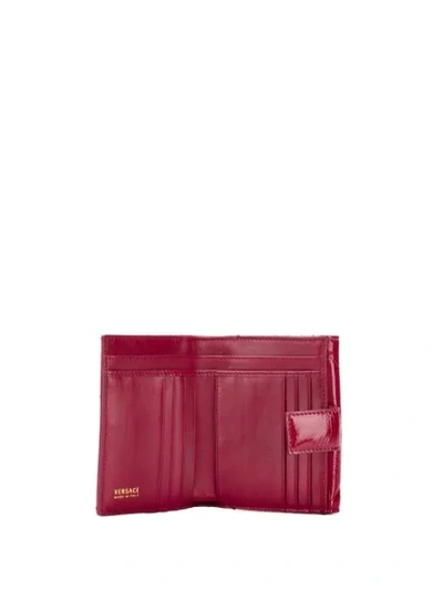 Shop Versace Medusa Plaque Wallet - Red