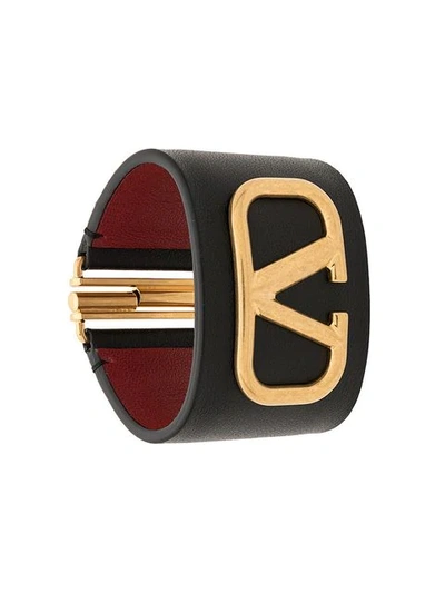 Shop Valentino Garavani Vlogo Cuff In Black