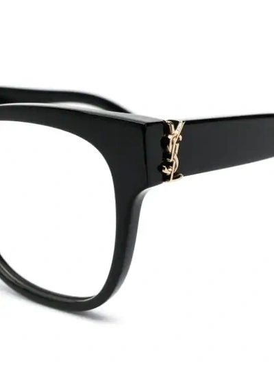 Shop Saint Laurent Oval Shaped Glasses In Black