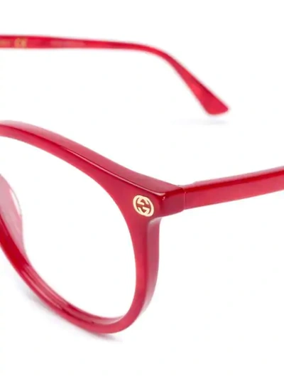 Shop Gucci Round Framed Sunglasses In Red
