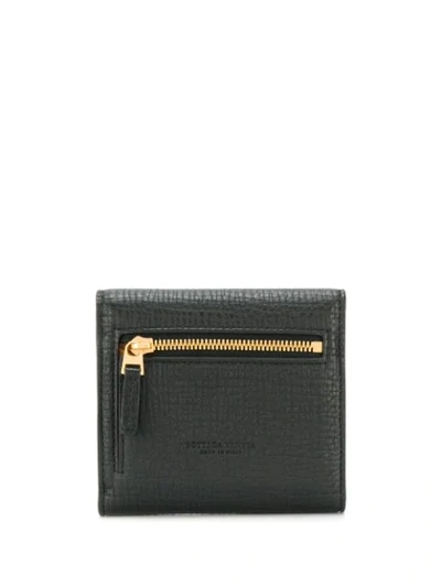 Shop Bottega Veneta Textured Foldover Wallet In Black