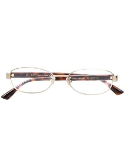 Shop Gucci Round Glasses In Gold