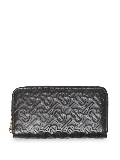 Shop Burberry Monogram Leather Ziparound Wallet In Black