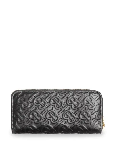 Shop Burberry Monogram Leather Ziparound Wallet In Black