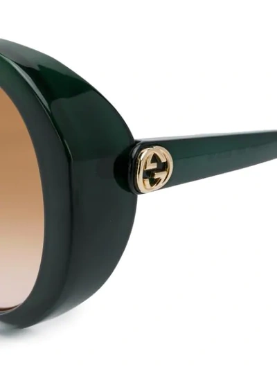 Shop Gucci Gradient Tinted Sunglasses In Green