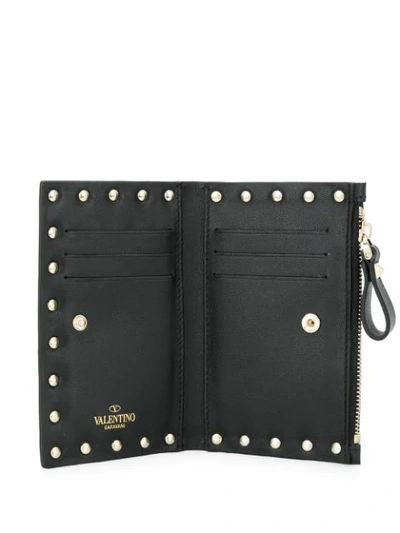 Shop Valentino Rockstud Bifold Wallet In Neutrals