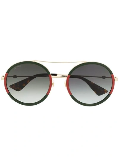 Shop Gucci Round Sunglasses In Metallic