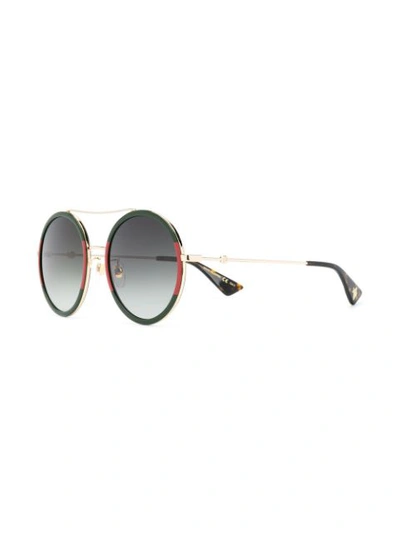 Shop Gucci Round Sunglasses In Metallic