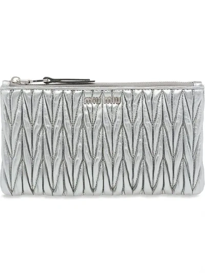 Shop Miu Miu Matelassé Envelope Pouch In Metallic