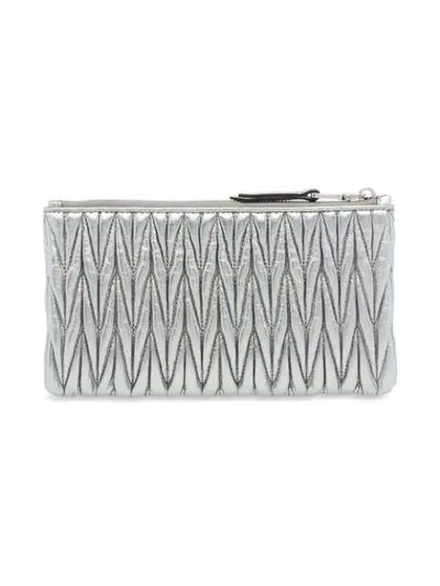 Shop Miu Miu Matelassé Envelope Pouch In Metallic