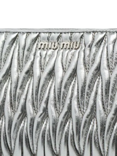 Shop Miu Miu Matelassé Envelope Pouch In Metallic