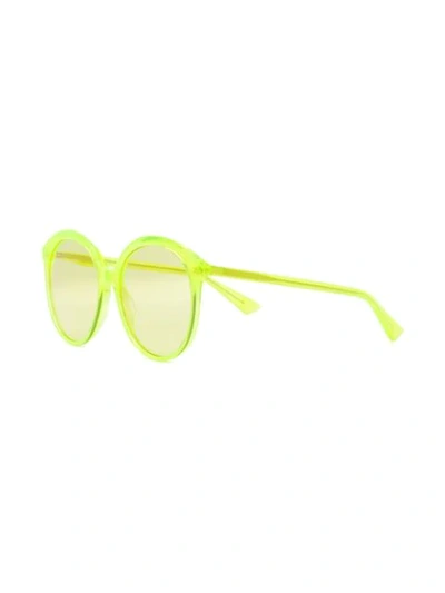 Shop Gucci Eyewear Tone On Tone Sunglasses - Yellow