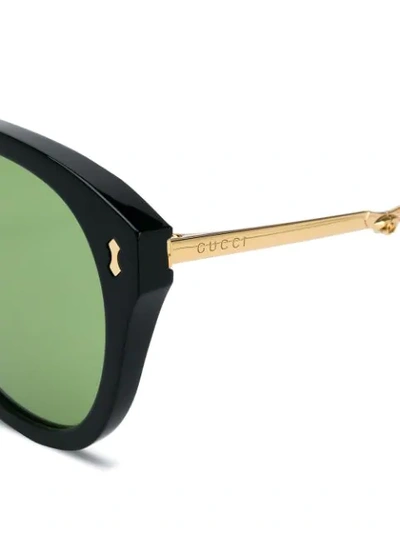 Shop Gucci Round Sunglasses In Black