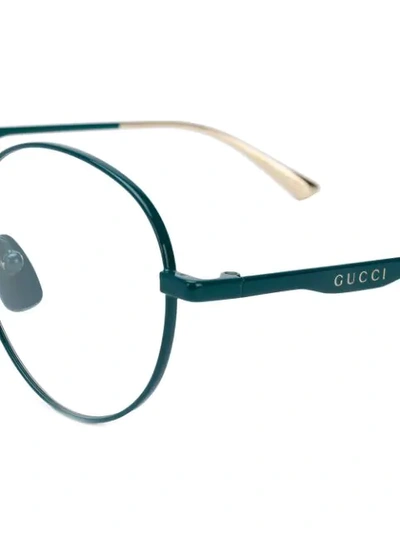 Shop Gucci Eyewear Round Frame Glasses - 003