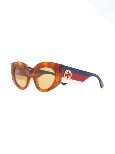 Shop Gucci Eyewear Oversized Cat Eye Sunglasses - Brown