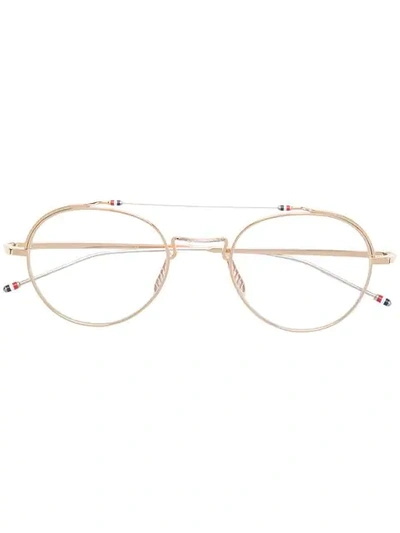 Shop Thom Browne Eyewear Rounded Clear Glasses - Gold
