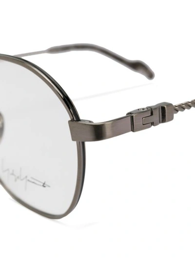 Shop Yohji Yamamoto Round Shaped Glasses - Silver