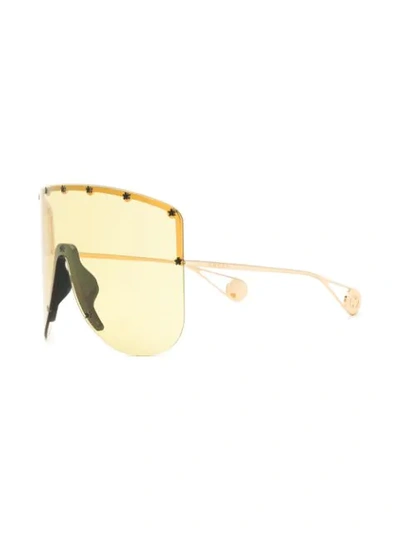 Shop Gucci Eyewear Tinted Mask Sunglasses - Yellow