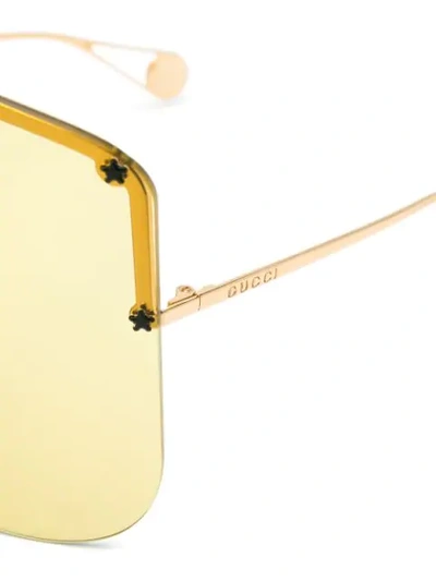 Shop Gucci Eyewear Tinted Mask Sunglasses - Yellow