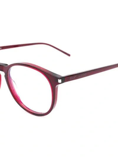 Shop Saint Laurent Round Frame Glasses In Red